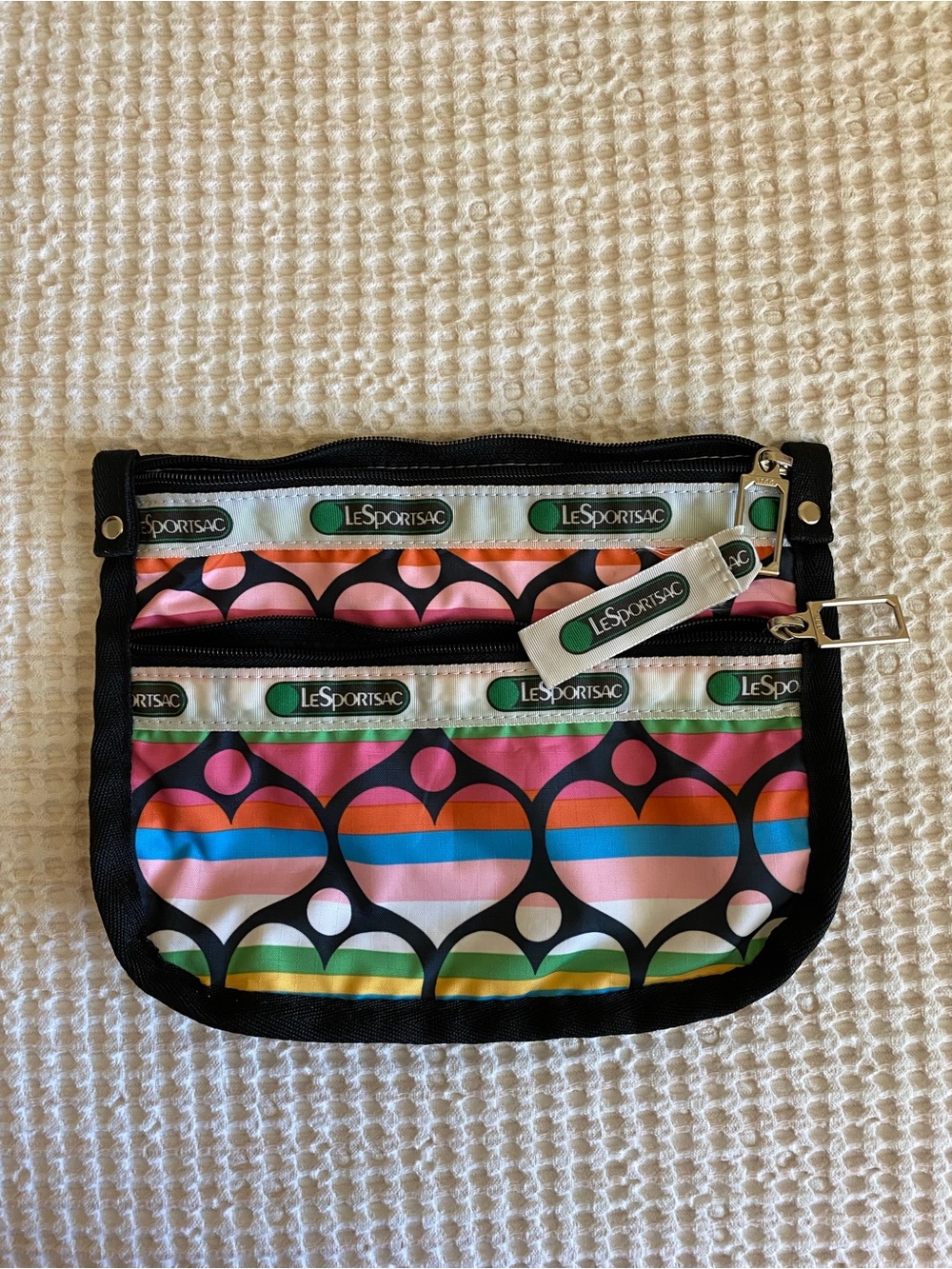 LESPORTSAC 2-Tiered Zip Bag in Vibrant Striped Hearts